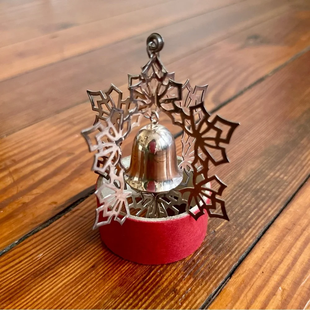 Vintage Reed & Barton silver spinning snowflake  & bell Christmas ornament